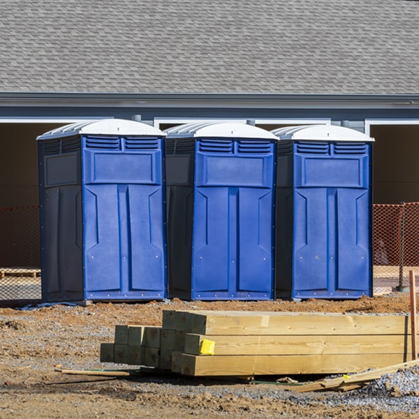 what is the cost difference between standard and deluxe porta potty rentals in Clay